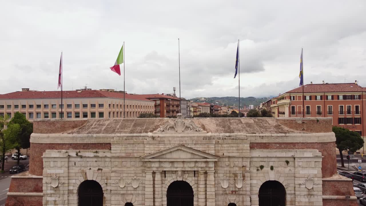 Porta Nuova, a historic gateway in Verona, Italy, stands proudly with beautiful city architecture behind.