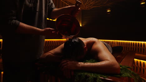 traditional water pouring therapy in a sauna