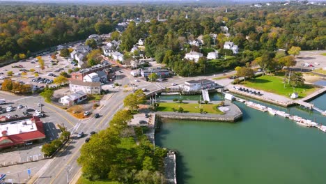 aerial hyper lapse showing dynamic movement of traffic along the yacht club