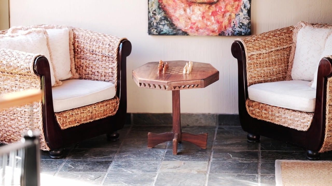 Two large, comfortable chairs and a chess table