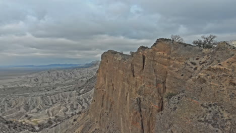 edge cliff in vashlovani national park area with beautiful colorful autumn