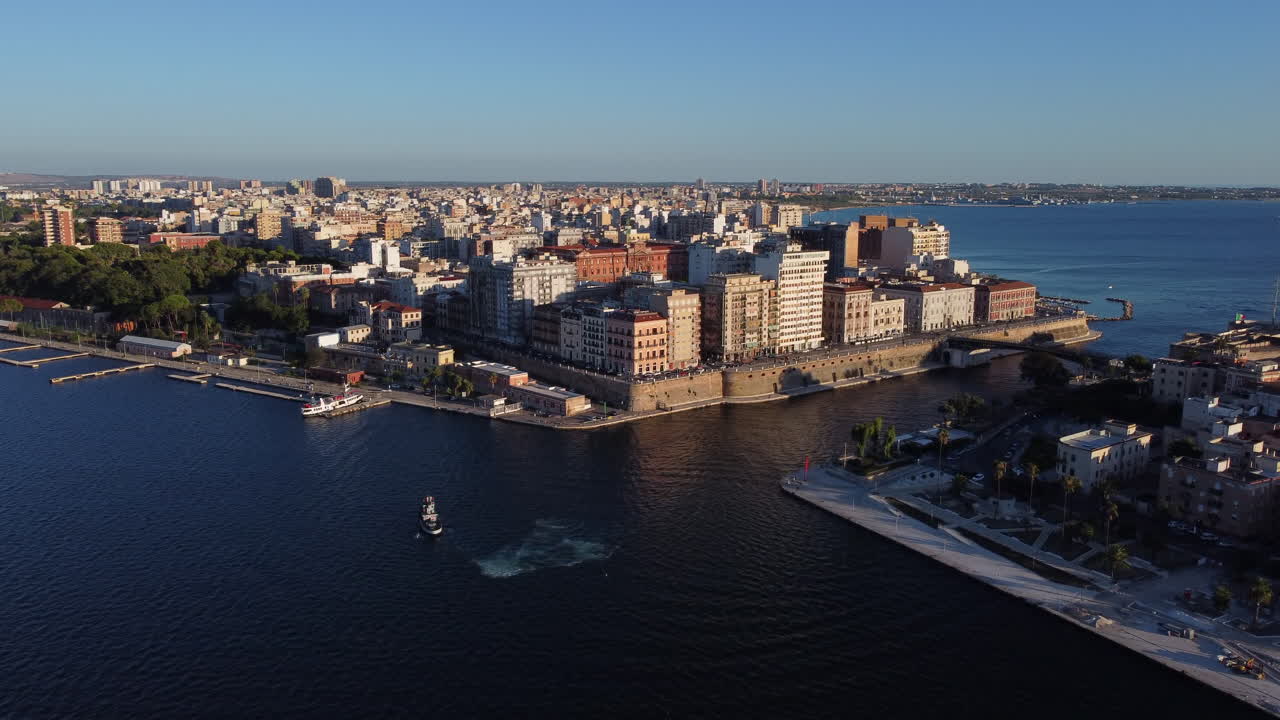 Waterfront Buildings On Taranto's Old Town Peninsula In Puglia, Italy. drone shot