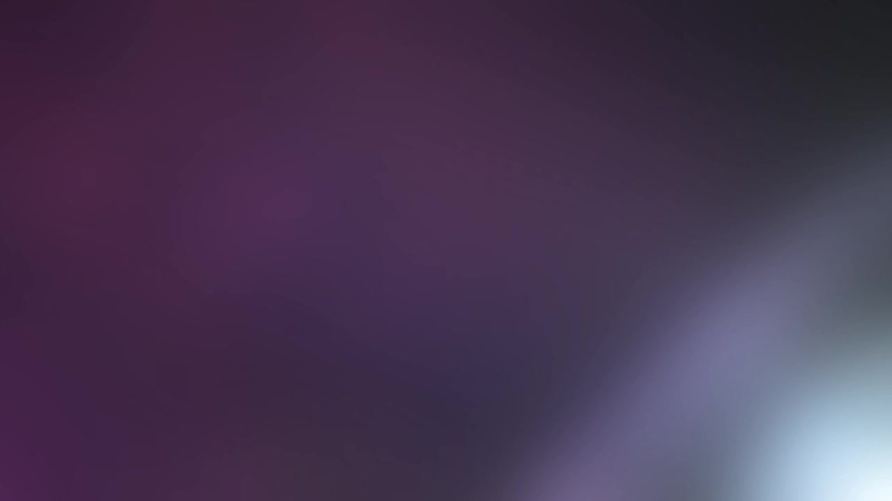 Ethereal Light Leaks and Lens Flares on Dark Purple Background