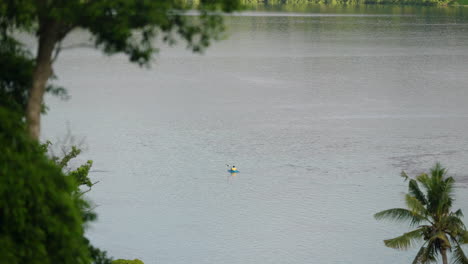 Man-On-Kayak-At-Sunset-In-Moso-Island-In-Vanuatu---wide