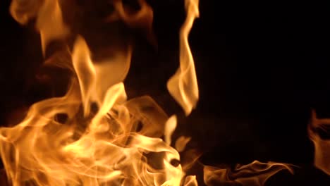 Flames-of-fire-on-black-background-in-slow-motion