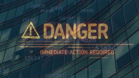 animation of danger text over data processing and office building