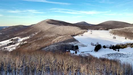 appalachain mountain snow scene aerial reveal near boone nc, north carolina