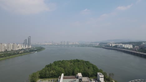 Aerial-shot-flying-over-the-Han-River-and-Nodeul-Island-in-Seoul-city