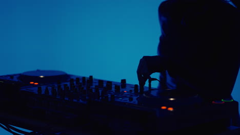 woman djing in a nightclub