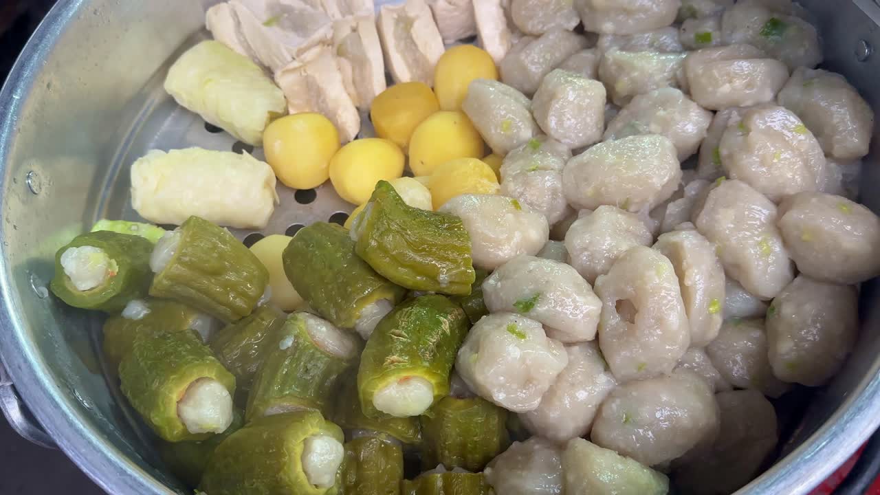 The process of steaming the siomay. Indonesian street food.