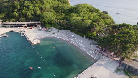 budva's sveti nikola island beach with dense trees, montenegro coastline