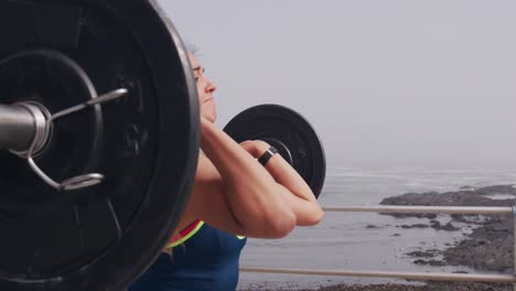 Caucasian-woman-working-out-on-the-docks