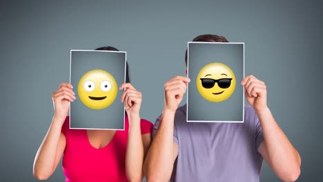 Animation-Von-Emoji-Symbolen-über-Einem-Kaukasischen-Paar