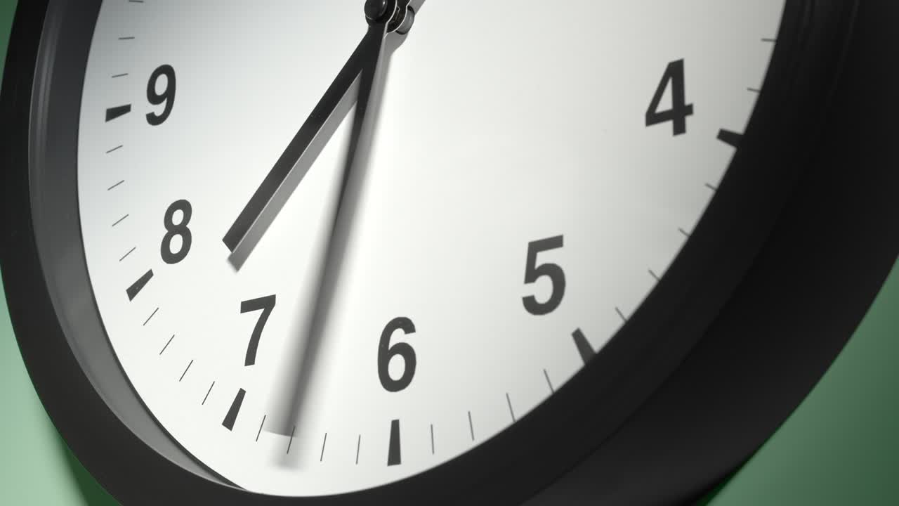 Clock Face on Light Green Wall in Time Lapse