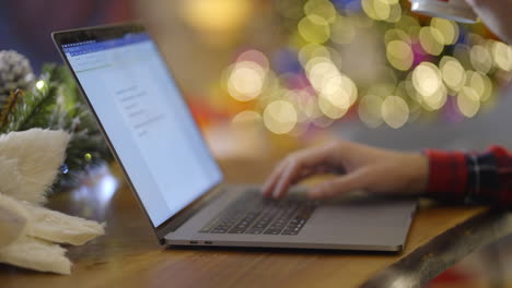 working on a laptop during the christmas season