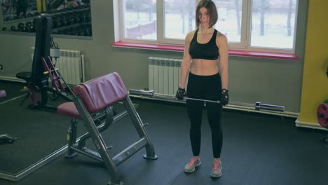 woman weightlifting in gym