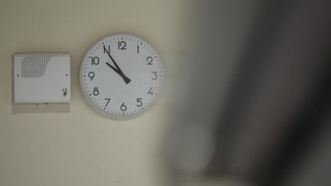 Typical-school-clock-anchored-on-a-wall