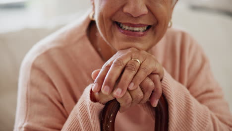 Hands,-senior-woman-and-walking-stick-for-support