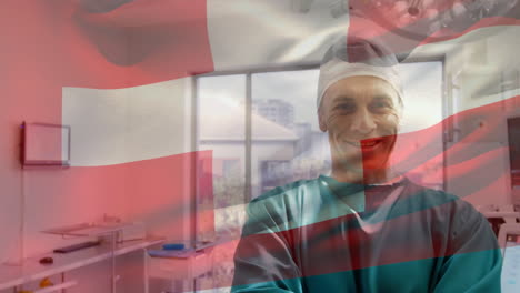 animation of flag of switzerland over happy caucasian male doctor