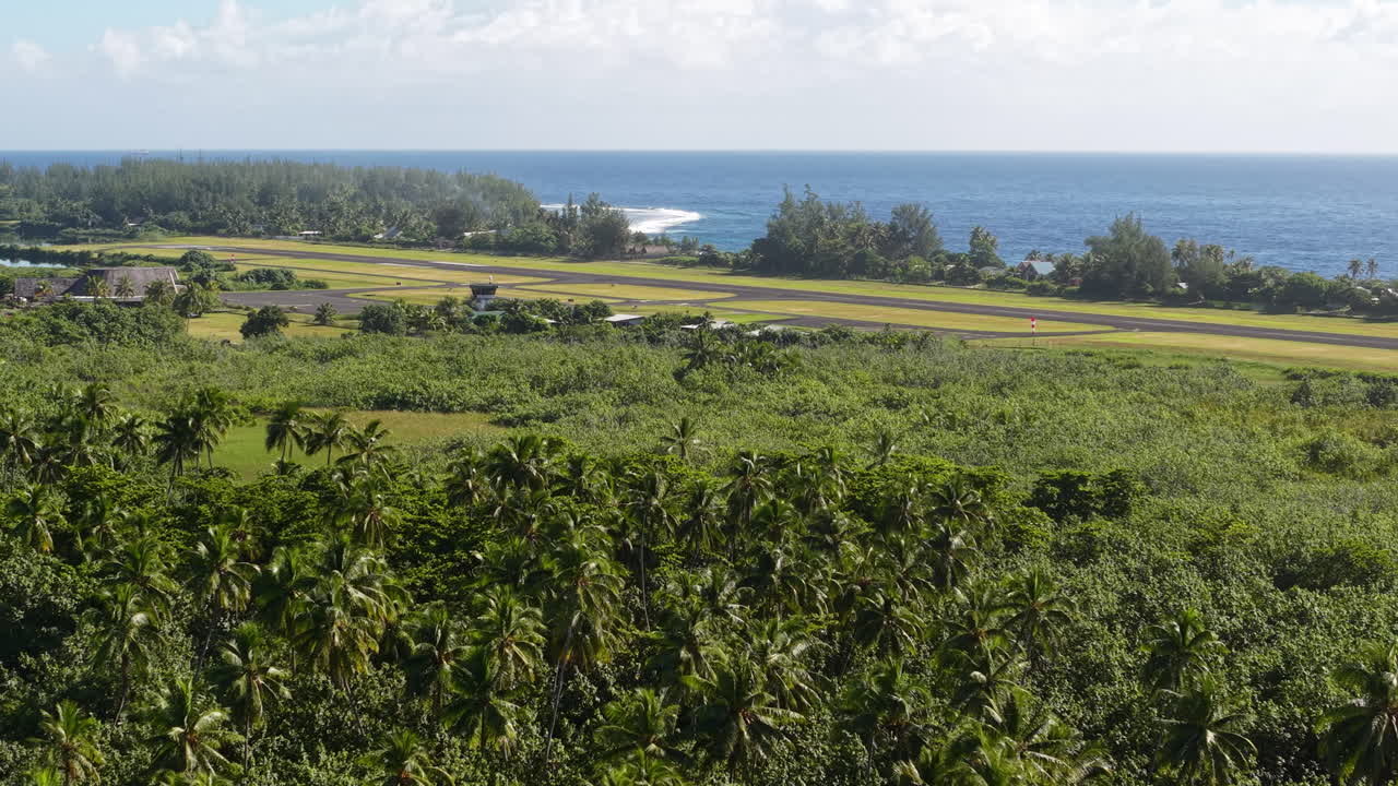 Moorea Island, French Polynesia. Aerial View Airport Runway and Green Tropical Landscape, Drone Shot