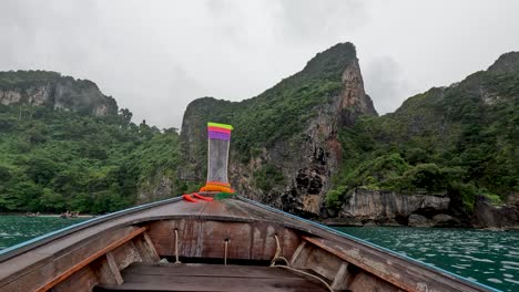 scenic boat ride past krabi's limestone cliffs