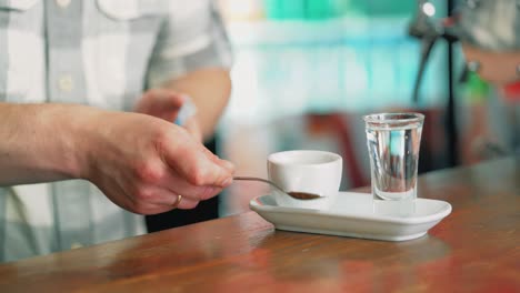black coffee served in white cup.