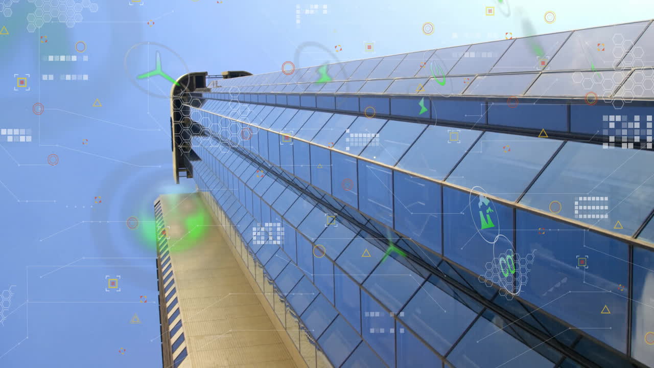 Futuristic digital data animation over modern glass skyscraper against blue sky