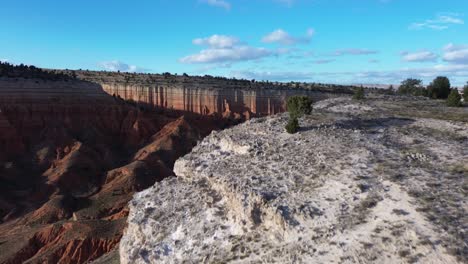 Aerial-flying-over-a-cliff-to-reveal-the-epic-vistas-of-Teruel-Canyon