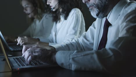 cropped shot of teleworkers using laptops