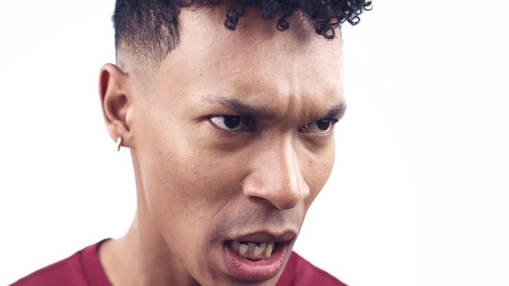 Angry, screaming and face of man on a white
