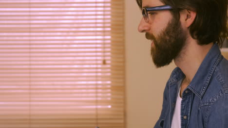 photo editor working at his desk