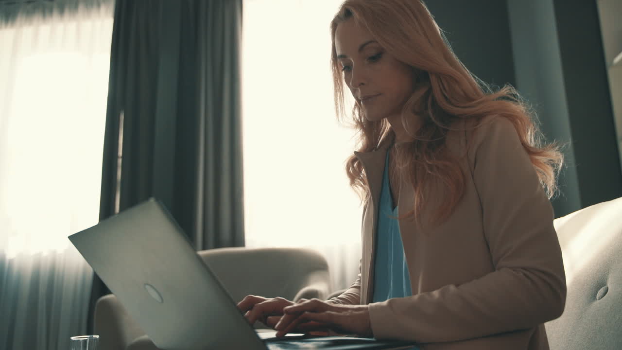 Back View Of A Sportswoman Running At The Park In A Sunny Day