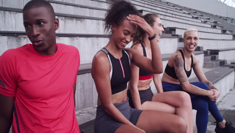 group of friends relaxing after training