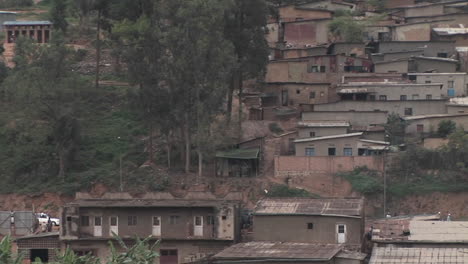 panright slowly across a hillside residential neighborhood in kigali rwanda