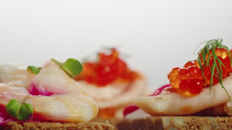 shrimp, caviar, and smoked fish canapés
