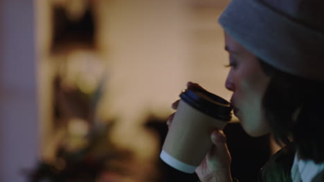 close-up-young-african-american-business-woman-using-laptop-computer-browsing-online-reading-email-messages-drinking-coffee-working-late-at-night