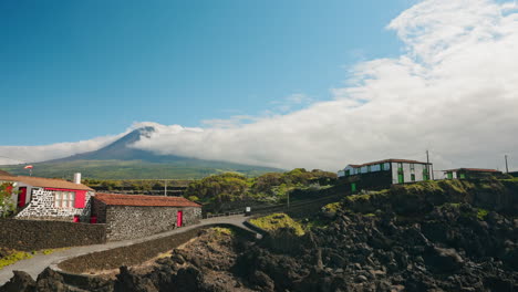 wide panning shot of mount pico in the azores islands - portugal