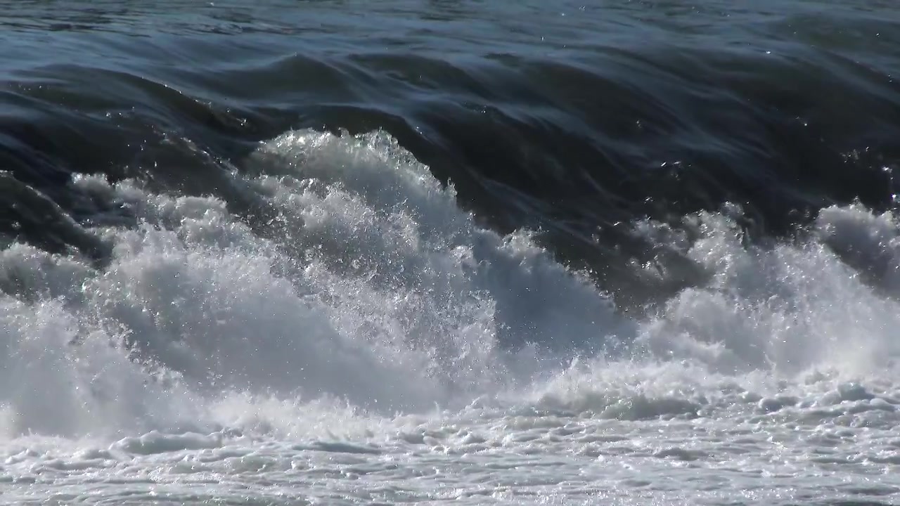 Powerful Ocean Wave Crashing and Breaking on Shore