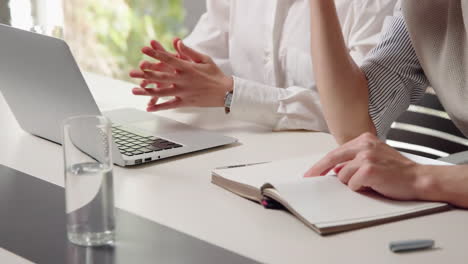briefing discussion, male and female businessmen work together to inspect sales documents. marketing analysis and action plans. discuss financial analysis, sales management concepts