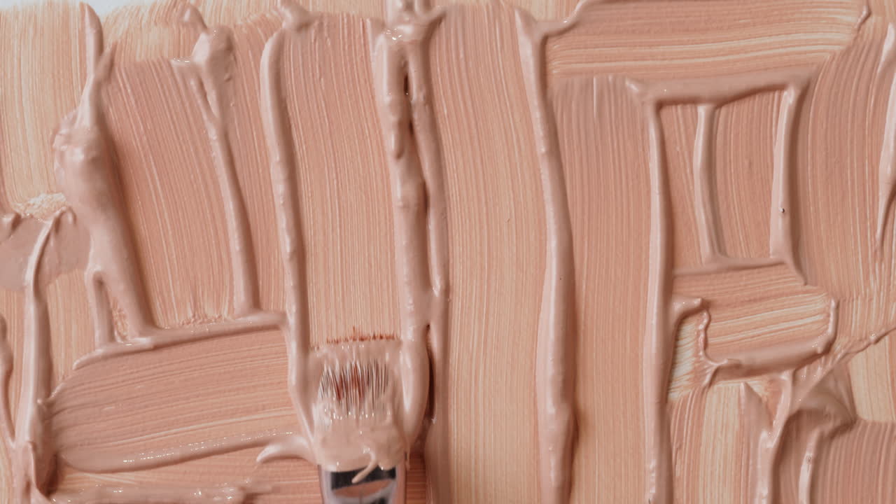 Applying foundation with a brush
