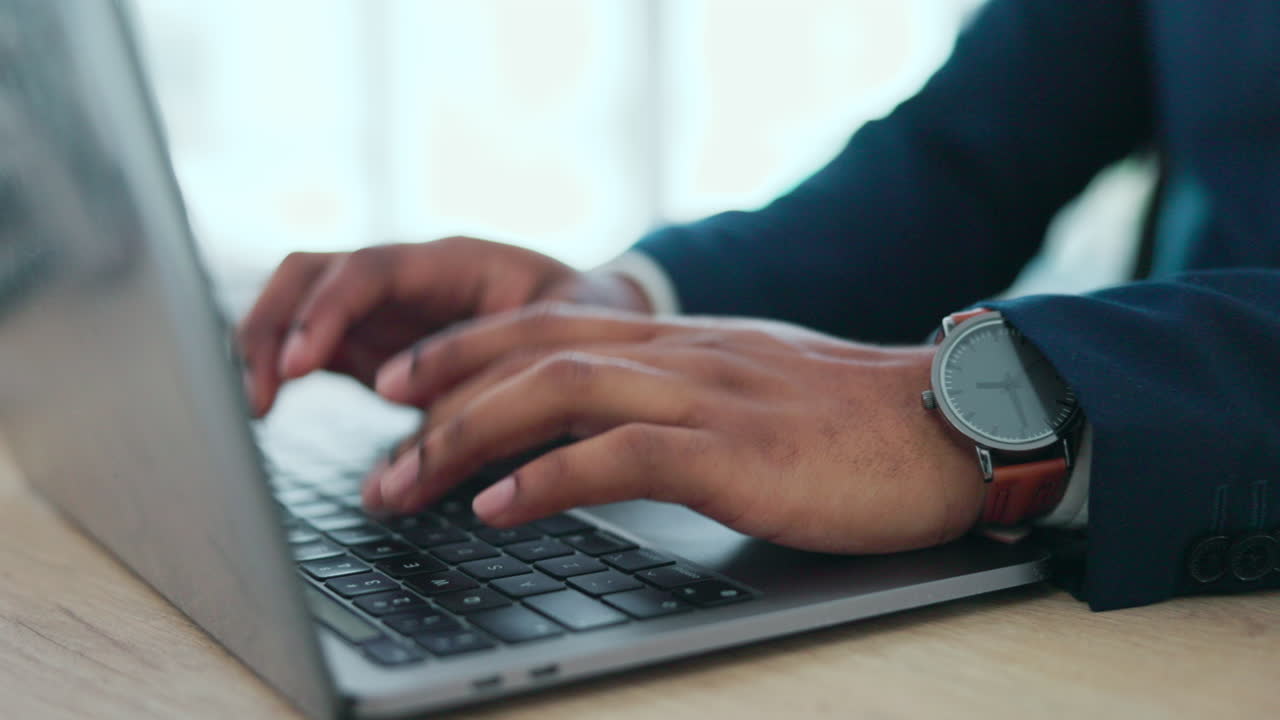 Typing, keyboard and hands of a businessman