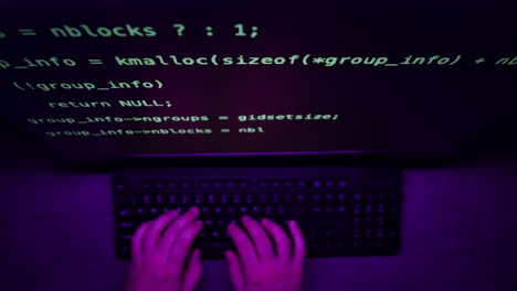 person typing code on a computer