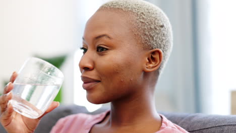 Glass-of-water,-hydrate-and-happy-drinking-woman