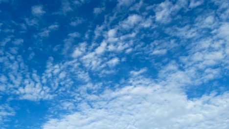 clouds are moving in the blue sky. timelapse