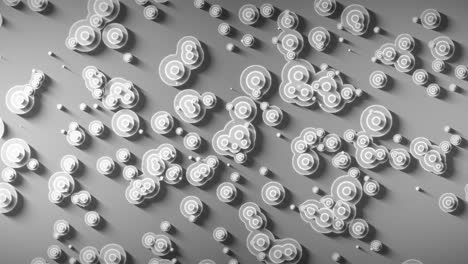 black and white retro type top-view animation of a scene of round stacked circle objects with edge rim casting long shadows on the ground while randomly overlapping, while moving to the left and right