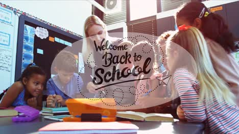 animation of welcome back to school text over caucasian teacher talking with diverse schoolchildren