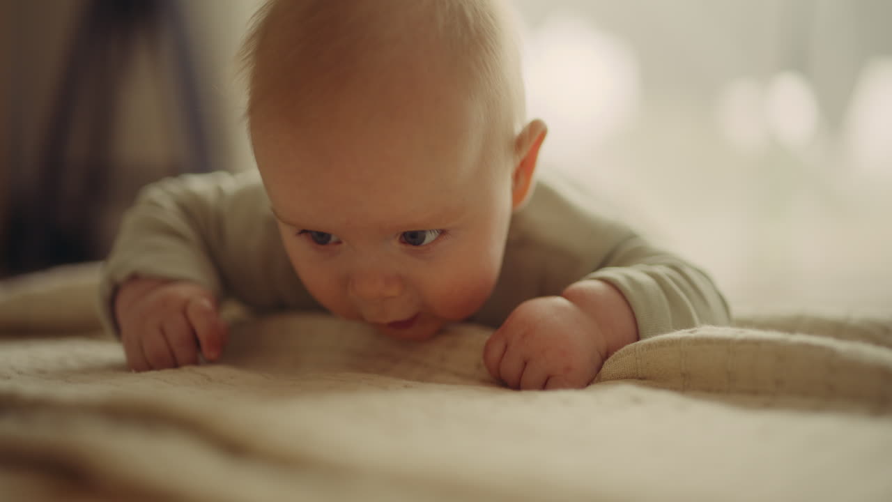Adorable baby lying on a blanket