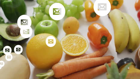 email icons animating over fresh fruits and vegetables