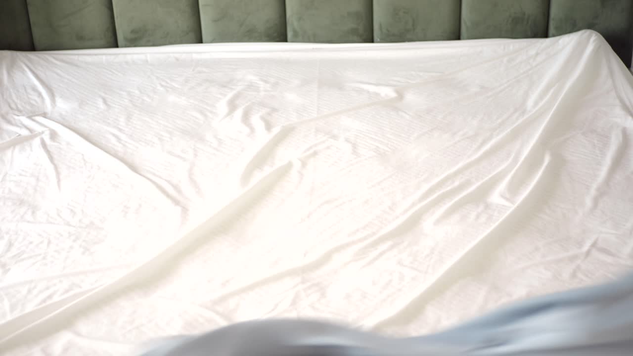 Sheets and pillows on a bed