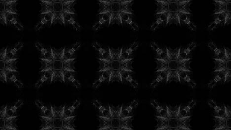 kaleidoscope on black background with changing shapes smoky animation